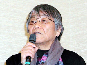 司会で挨拶する米沢慧氏